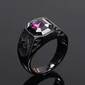 Macro view of black titanium steel men's ring featuring a square cut purple gemstone - Black/Purple Zirconia