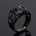 Macro view of a black Freemasonry signet ring with a square black gemstone - Black/Black Zirconia