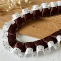 Detailed macro of brown and white polka dot pleated double-layer lace ribbon trim - Crypto Coffee Polka Dot Design 1 Meter Long And 2.5 Cm Wide.