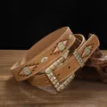 Close-up detail of a vintage bohemian embroidered leather belt with geometric diamond patterns - 105cm / Camel