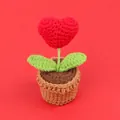 Handmade crochet potted plant featuring a red heart-shaped flower in a brown knit pot - Red