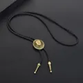 Detailed view of bronze cowboy hat bolo tie with black braided leather cord - Bronze Leather Cord