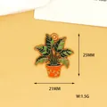 Détail montrant les dimensions de 25x21 mm de ce pendentif en émail plante verte. - Feuille de Monstera