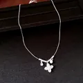 Detailed shot of silver necklace with zircon flower pendant and pearl accent - Lucky Clover Flower (HN12932) / 41cm-50cm / Silver