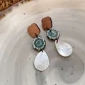 Close-up of vintage Maillard style earrings with wood square and ceramic flower detail - Shell Texture Dangle Style (27#)