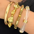 Stackable 4-piece set of gold irregular texture and clear acrylic bracelets for women - Cold Style Gold Irregular Texture Bangle 4-Piece Set (1151)