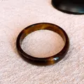 Detailed view of retro amber resin bangle with elegant marble pattern. - Coffee Resin Round