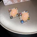 Detailed close-up of Bohemian vintage square earrings with peach stones and crystals - Streaming Flower Tassel (19# 925 Sterling Silver Earring Post-Gold) / Pink