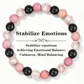 Detail of 8mm pink and black beaded healing crystal bracelet for emotional balance - Stabilize Emotions / 8mm Bead Diameter