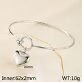 Elegant silver stainless steel bangle featuring a polished heart pendant charm 62mm diameter - 3D Heart (KB86869-Z)