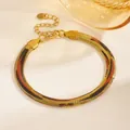 Close-up view of leopard print gold stainless steel snake chain bracelet for women - Snake Skin Style (D710) / Gold Snake Skin