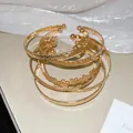 Vintage style gold-toned stackable bangle set for women in an elegant arrangement - 6-Piece Set / Style 27 - Gold