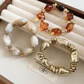 Chic irregular resin and gold bead stretch bracelets in amber and marble tones - 52# Bracelet / Three-Piece Set / Gold-Coffee-Khaki