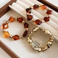 Set of chunky irregular gold-tone cuff and amber resin bead bracelets - 53# Bracelet / Three-Piece Set / Gold Brown