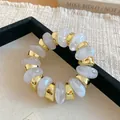 Modern irregular bracelet featuring white marble-effect and gold-plated chunky beads - White and Gold Contrast Geometric Style (66#手链) / Gold-Clear