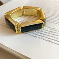 Bold statement geometric gold-toned bracelet with black rectangular resin inserts - 67# Bracelet
