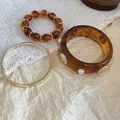 Vintage style amber resin and gold metal bracelet set with pearls and shell charms - 74# Bangle (3-Piece Set)