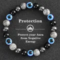 Protective triple beaded bracelet with black obsidian hematite and blue evil eye charms - Protection-15