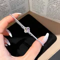 Elegantes silbernes Netzarmband mit einem farbenfrohen vierblättrigen Kleeblatt-Zentrum - Vierblättriges Kleeblatt Pavé-Mehrfarbstil (67#)