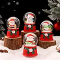 Festliche Weihnachtsschneekugeln mit Weihnachtsmann und Schneemann auf rustikalem Holz. - 2606# (lichter + Schneeflocken) / 45# (kartonverpackung)