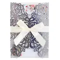 Elegant laser cut wedding invitation card with silver rose pattern and white ribbon bow - Reflective Silver