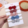Set of five infant waffle fabric knotted bow headbands in assorted solid colors. - 5F Combination