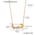 Vue détaillée d'un collier épingle de sûreté en acier inoxydable doré avec citrines - Collier En Cristal Jaune Doré P1489