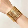 Stylish gold-plated African punk style multi-layer wire bangles for women on wrist - Stackable Metal Thin Bangle / Width 4cm / Gold
