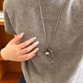 Elegant Korean style silver long necklace with heart and stone pendants on grey sweater - 30# Necklace - Silver - Brown - Small Fish