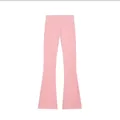 Pantalon évasé en polaire rose avec une taille haute pour un look d'automne élégant. - Pantalon Rose