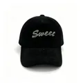 Close-up of a black plush baseball cap with silver glitter 'Sweet' lettering decoration. - Adult Size (58cm, Adjustable) / SWEET Black