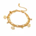Elegantes goldfarbenes doppelschichtiges Edelstahlarmband mit Lotusblumen- und Perlenanhängern - Zweilagiges Lotus-Armband / Gold