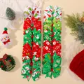 Festive Christmas hair bows for girls featuring snowman and Santa Claus ribbon prints. - Multicolor Style 20B