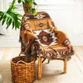 Couverture style bohème indien avec motifs géométriques et franges sur une chaise - Seattle / 160*130CM