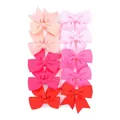 Set of 10 colorful grosgrain ribbon swallowtail bow hair clips for girls in pink and red. - 10-Piece Pink Gradient Set (10AD)