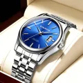 Stilvolle Herrenuhr aus Edelstahl mit blauem Zifferblatt und Kalender in Geschenkbox. - Herrenstil / Herrenuhr mit silbernem Stahlband und königsblauem Zifferblatt