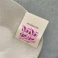 Pink butterfly-shaped BB hair clips on a handmade accessories card. - Rose Pink