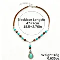 Collier bohème vintage avec pendentif goutte en turquoise et perles en bois - N2607-2 Bois De Vent De L'ouest