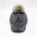 Detail of grey plush baseball cap with rhinestone letter A and faux fur pom-pom. - Adult 58cm Adjustable / Rhinestone Letter A & Raccoon Fur Pom-pom Style / Gray