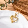 Süße goldene herzförmige Halskette mit Kristallen und feiner Flügel-Struktur für Damen - Schleifen-Herz Gold Stil (XL5926)
