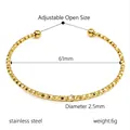 Bracciale rigido regolabile in acciaio inox sfaccettato oro con perle, 61 mm - Bracciale a tutto stelle dorato