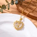 Elegante goldene Herzhalskette mit Ballerina-Figur und funkelnden Kristall-Akzenten - Spitzenherz Balletttänzerin Gold Stil (LX5950)