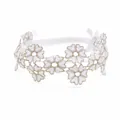 Detailed view of a delicate white floral lace headband with gold trim accents for baby girls - MB088 / -