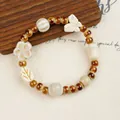 Handmade ceramic beaded bracelet with butterfly and flower charms in ancient style - Butterfly and Leaf Mixed Style (643 Ere)