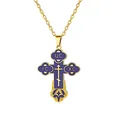 Close-up of golden stainless steel Orthodox cross pendant with purple enamel detail - Navy Blue Cross Style / Gold