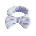 Fascia per capelli in flanella lavanda con fiocco per lavaggio viso e trucco - Una Fascia Per Capelli Con Fiocco Blu