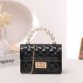 Mini black quilted silicone jelly bag with faux pearl handle and stylish gold chain strap - Black