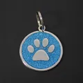 Blue glitter 30mm round pet ID tag with silver dog paw print design and metal ring - With Round Ring (HC537) / Light Blue