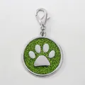 Round 30mm pet identity tag featuring a green glitter background and silver paw print - With Lobster Clasp (HC537) / Light Green