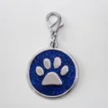 Round 30mm zinc alloy pet ID tag with sparkling blue glitter and silver paw print charm - With Lobster Clasp (HC537) / Dark Blue